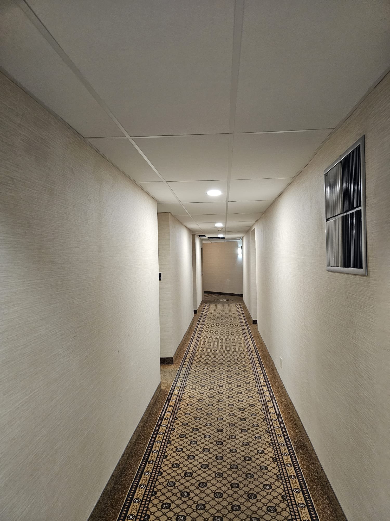 Finished commercial hallway renovation with modern finishes