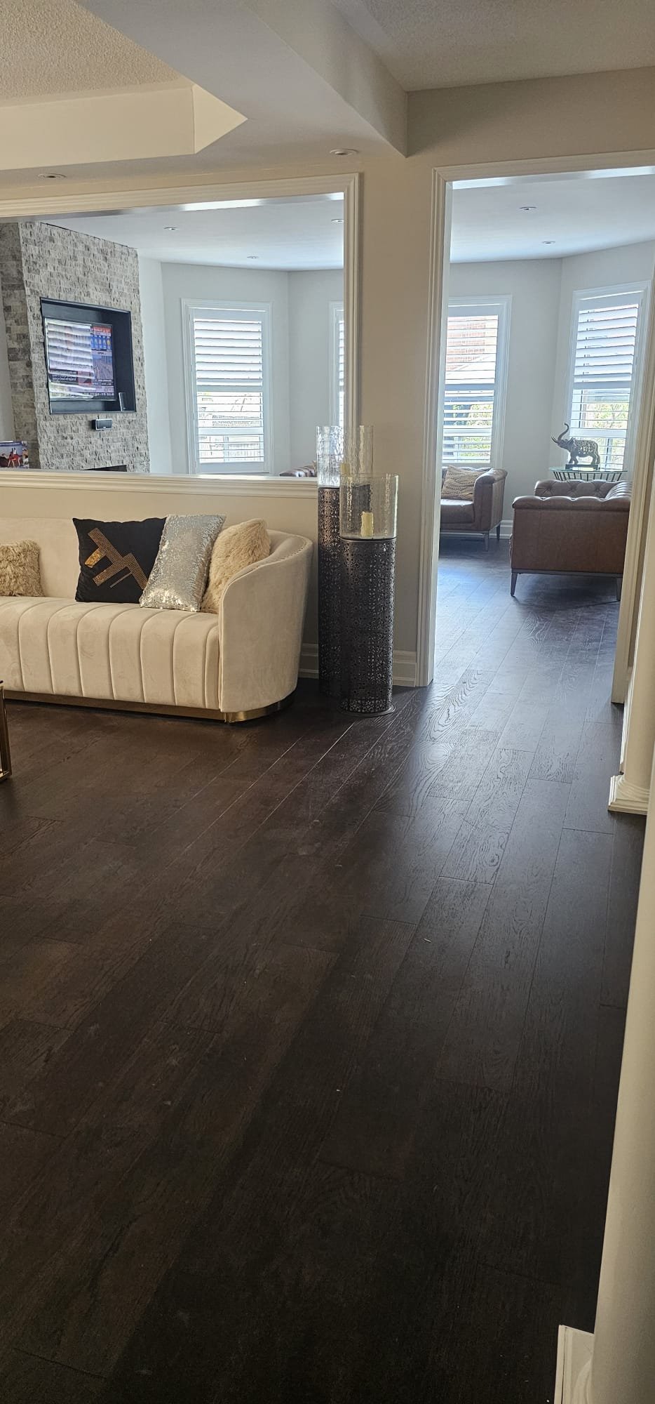Dark hardwood flooring installed in living room