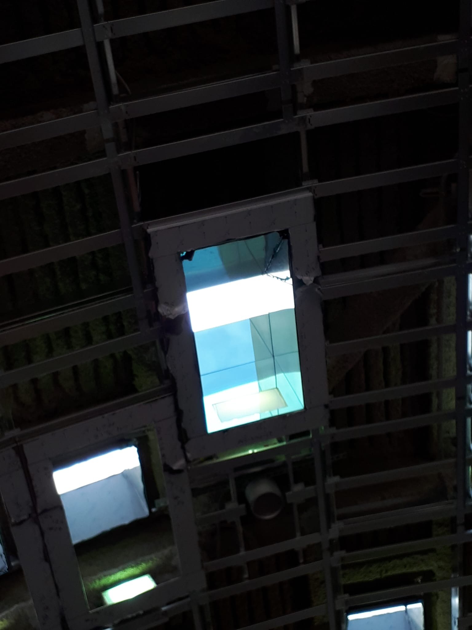 Curved glass sunroom ceiling architectural detail from inside