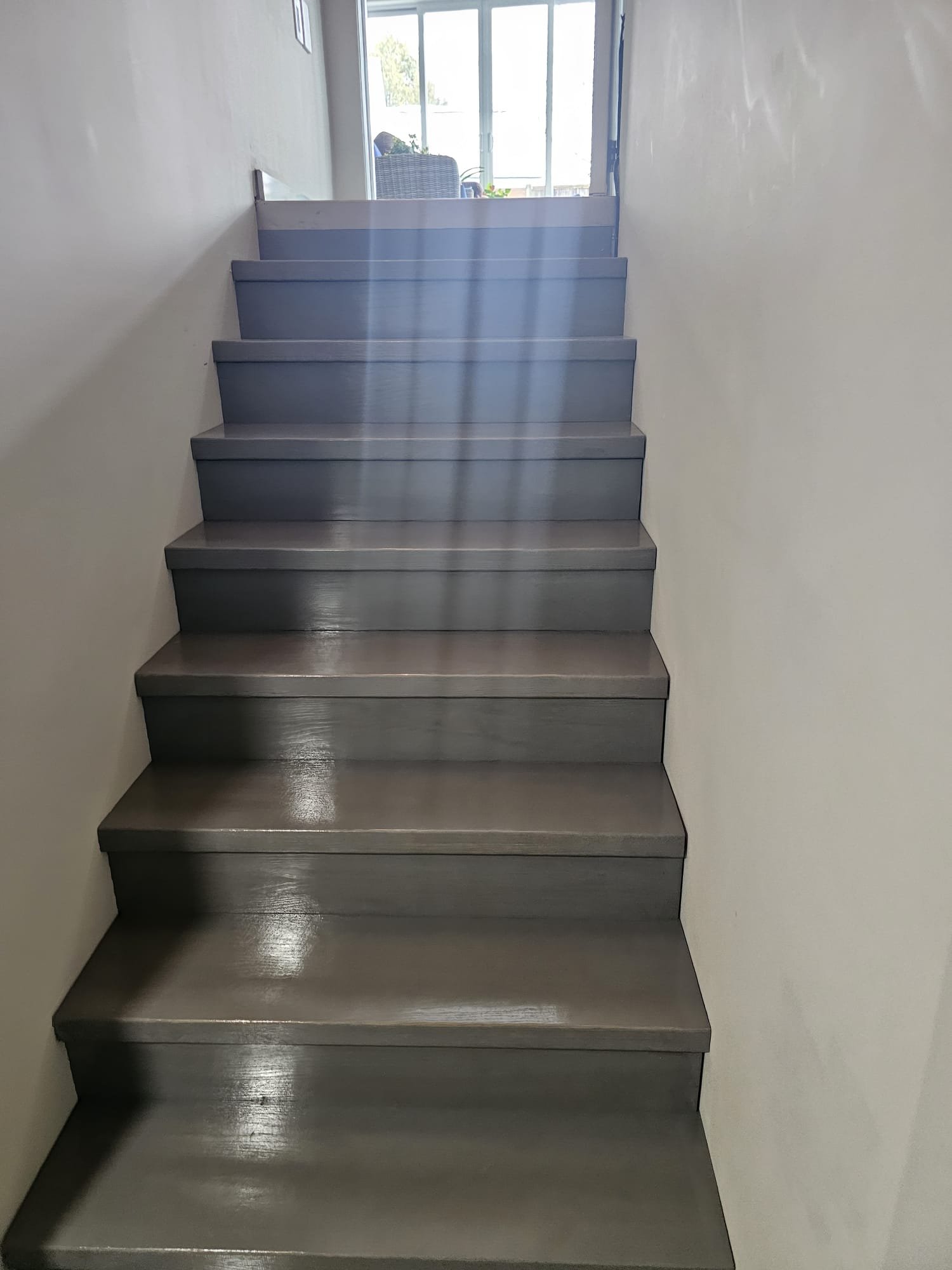 Gray laminate staircase renovation completed